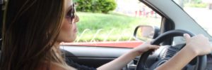 girl taking driving lessons